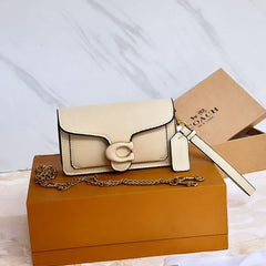 CO.ACH TABBY WRISTLET CUM SHOULDER BAG