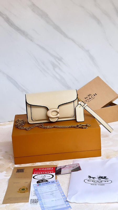 CO.ACH TABBY WRISTLET CUM SHOULDER BAG