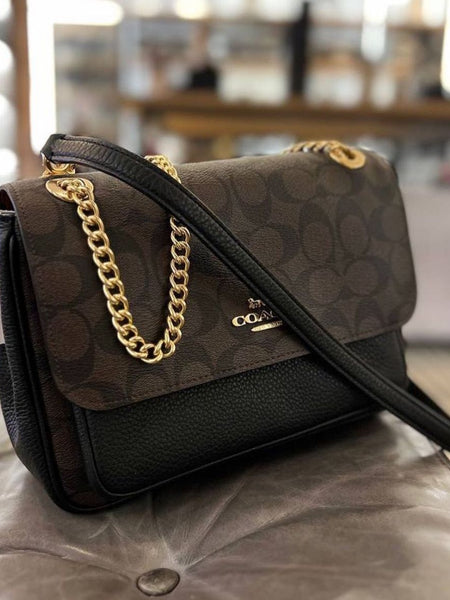 Co.ach klare sling bag