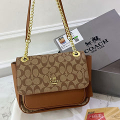 Co.ach klare sling bag