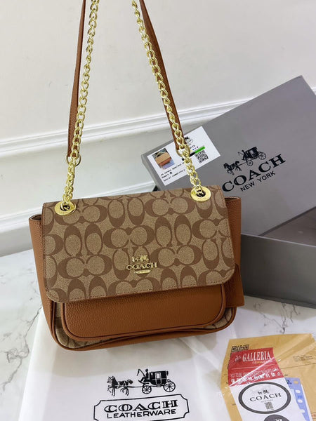 Co.ach klare sling bag
