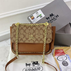 Co.ach klare sling bag