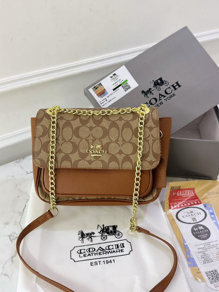 Co.ach klare sling bag
