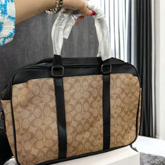 Coa.ch latest edition laptop bag