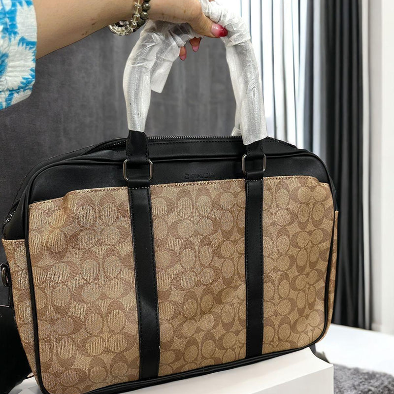 Coa.ch latest edition laptop bag