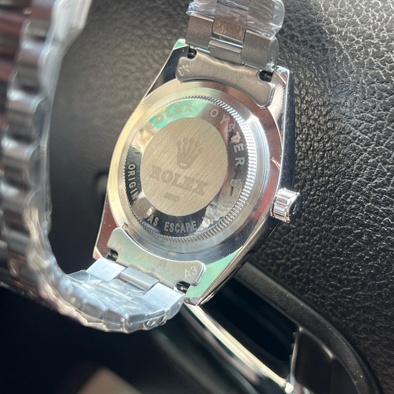 Rol.ex day date president quartz