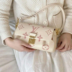 LOU.IS VUIT.TON EMPREINTE LEATHER BAG