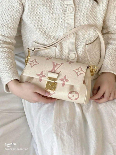 LOU.IS VUIT.TON EMPREINTE LEATHER BAG