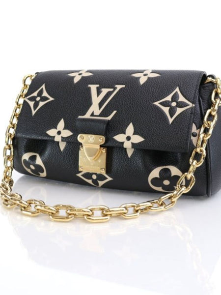 LOU.IS VUIT.TON EMPREINTE LEATHER BAG