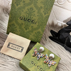Guc.ci earings