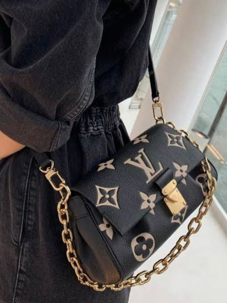 LOU.IS VUIT.TON EMPREINTE LEATHER BAG